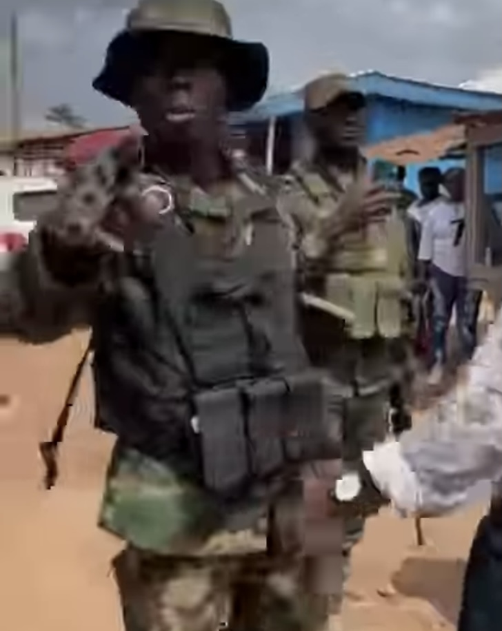 Elections 2024 – [Video] NDC Officer Clashes With Armed Soldiers To Stop Them From Storming Polling Station